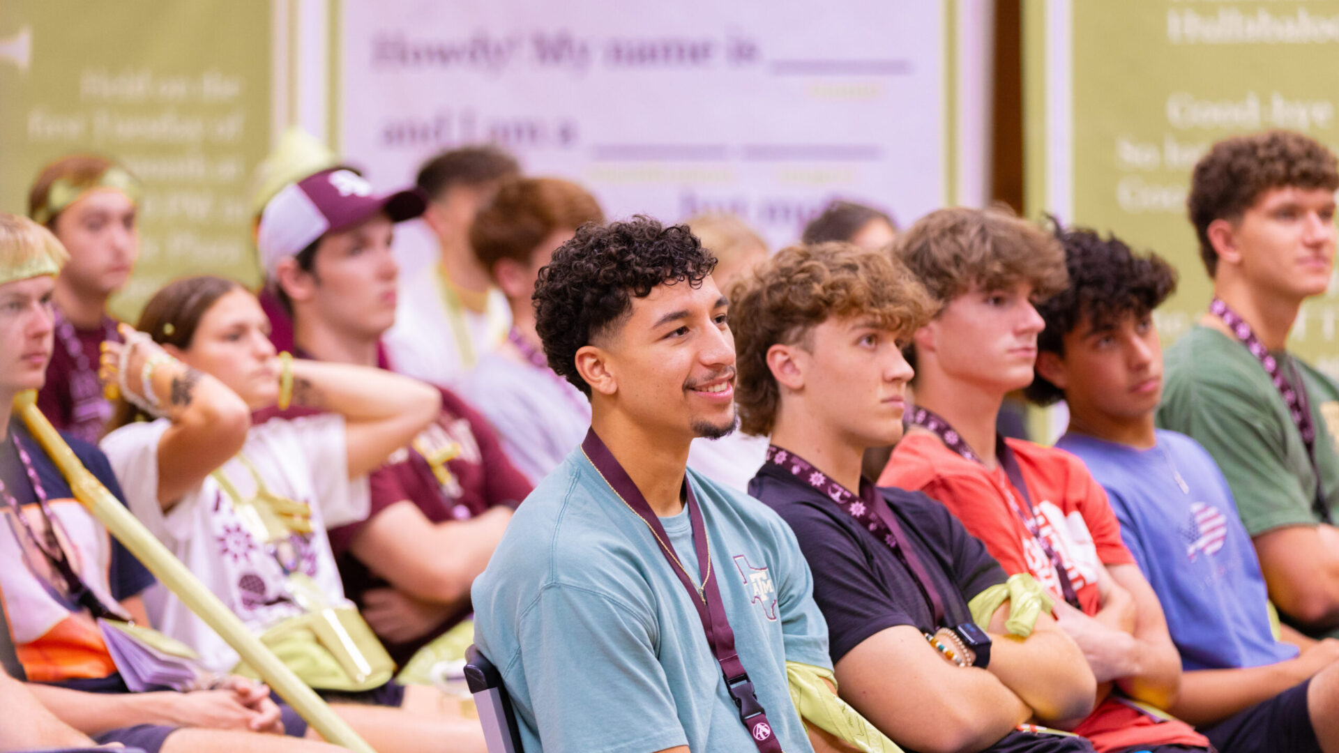 Student watching skits at Fish Camp